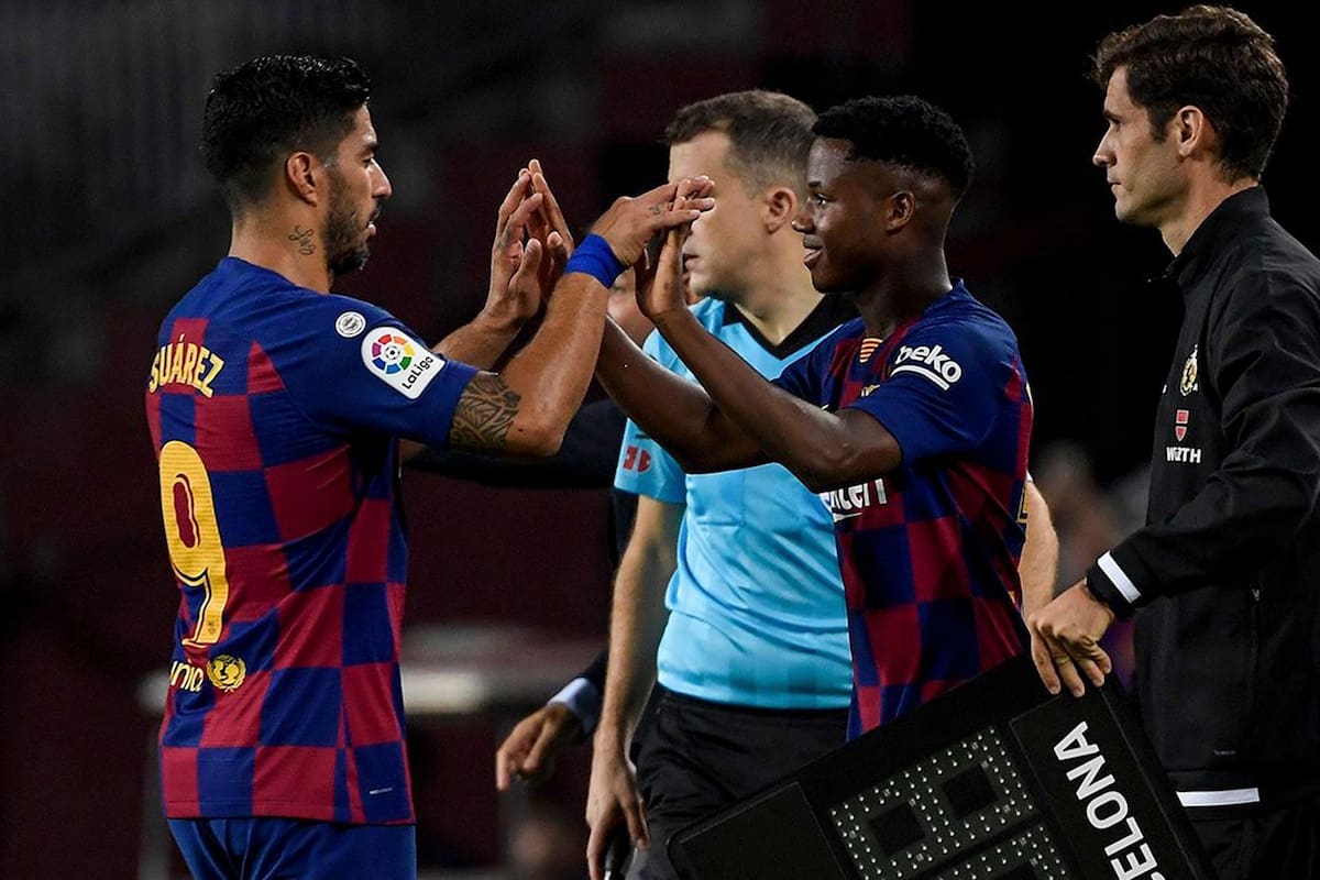 Ansu Fati y Luis Suárez