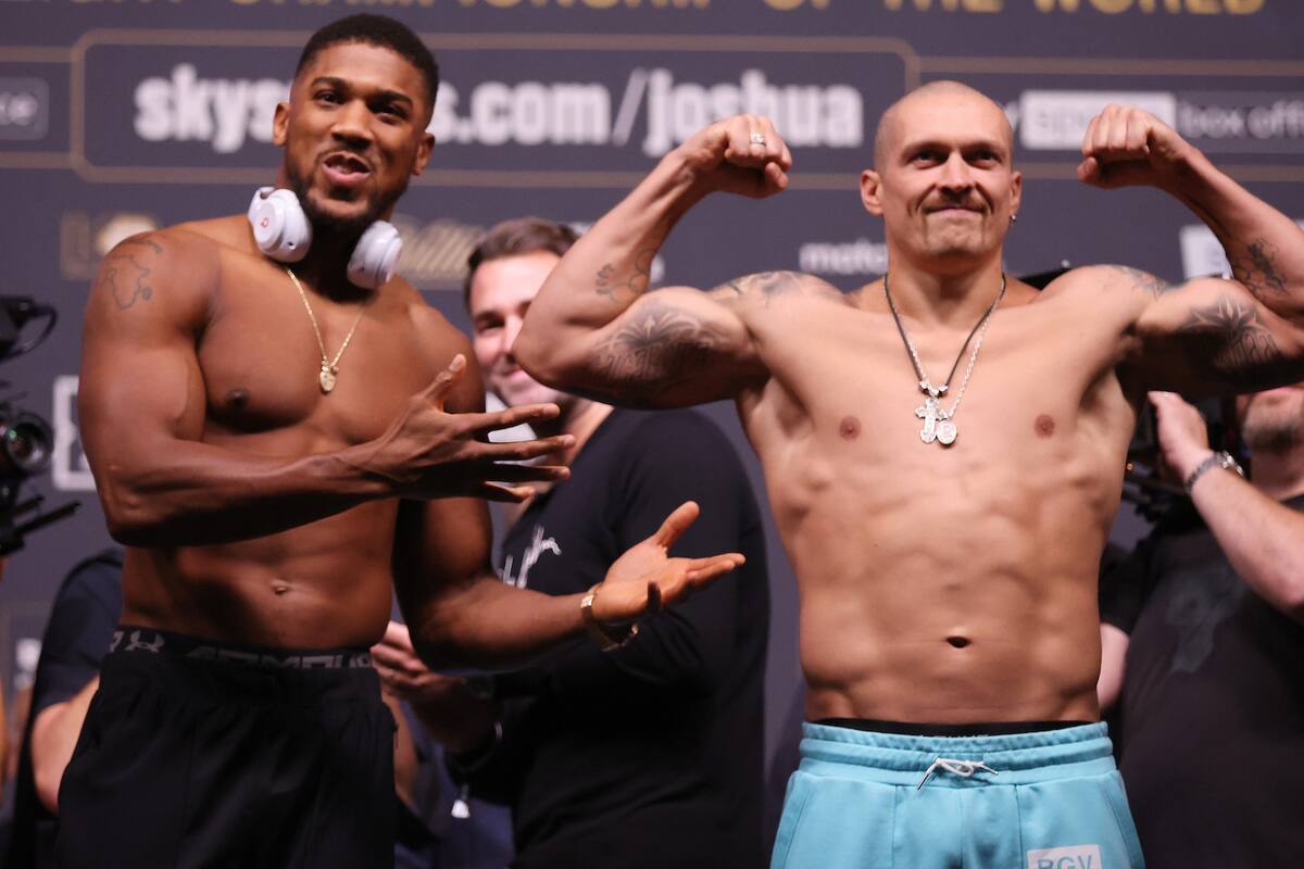 Anthony Joshua y Oleksander Usyk antes de pelear en el Tottenham Hotspur Stadium de Londres, en Septiembre de 2021