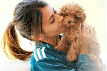 Anto Roccuzzo y su perro Abú