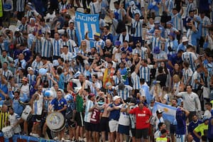 Argentina fans cheer prior to the Qatar 2022 World Cup quarter-final football match between The Netherlands and Argentina at Lusail Stadium, north of Doha on December 9, 2022. (Photo by FRANCK FIFE / AFP)
