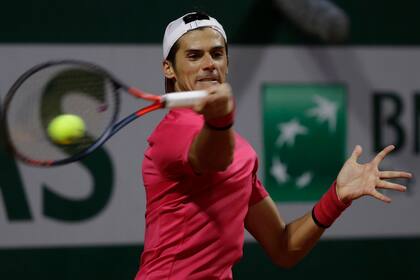 Argentinas Federico Coria plays a shot against Italys Jannik Sinner in the third round match of the French Open tennis tournament at the Roland Garros stadium in Paris, France, Friday, Oct. 2, 2020.