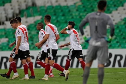 Argentina's River Plate Gonzalo Montiel (2-R) celebrates after scoring a penalty kick during the Copa Libertadores football tournament group stage match between Brazil's Fluminense and Argentina's River Plate at Maracana Stadium in Rio de Janerio, Brazil, on April 22, 2021.