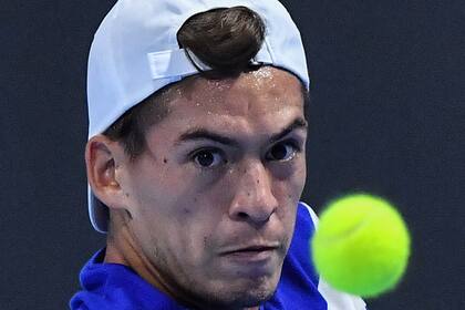 Argentina's Sebastian Baez returns a shot to USA's Sebastian Korda during their group stage match at the Next Generation ATP Finals on November 10, 2021 at the Allianz Cloud venue in Milan. (Photo by Tiziana FABI / AFP)