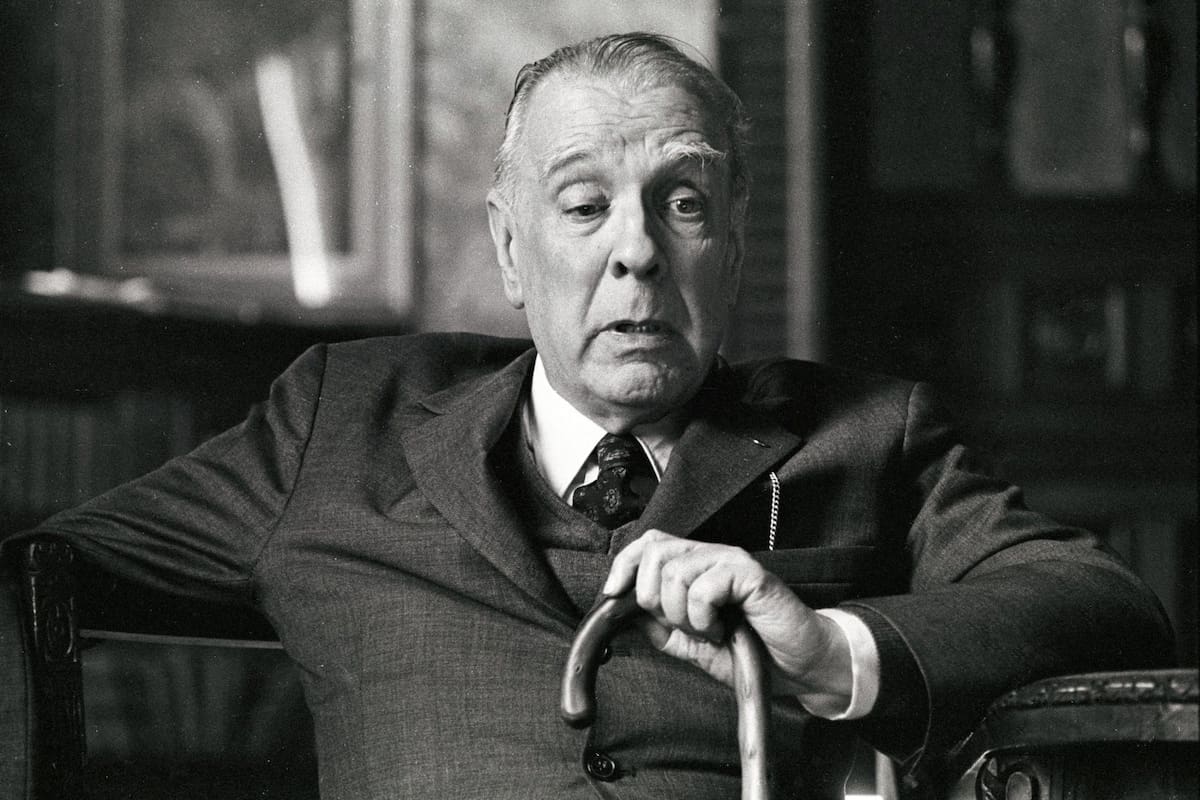 Argentine writer and poet Jorge Luis Borges (1899-1986) at his office in the old National Library building, in downtown Buenos Aires, in 1973. Borges directed the Argentine National Library from 1955 to 1973, before resigning after the Peronist party regained power. (Photo by Horacio Villalobos/Corbis via Getty Images)