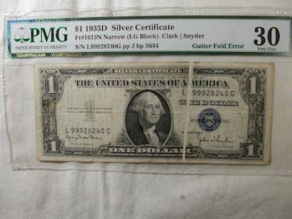 Así es un billete con un error de pliegue del canal