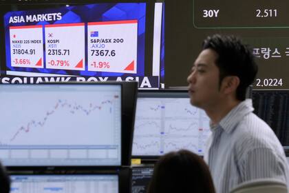 Asia vivió una semana difícil en sus mercados por los aranceles de Trump. (AP Foto/Ahn Young-joon)