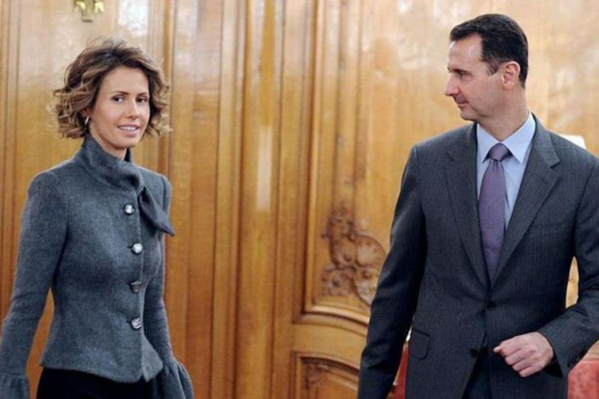 Asma al Assad junto a su marido Bashar, en una fotografía de 2010