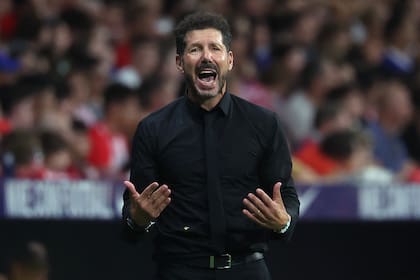 Atletico Madrid's Argentine coach Diego Simeone reacts during the Spanish league football match between Club Atletico de Madrid and Girona FC at the Metropolitano stadium in Madrid on August 25, 2024. (Photo by Pierre-Philippe MARCOU / AFP)