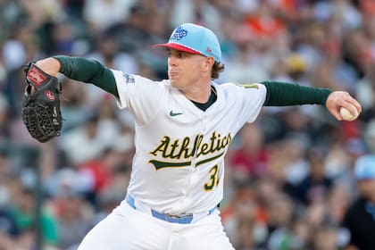 Atléticos apabullan 11-2 a Gigantes con 6 entradas de Sears en blanco