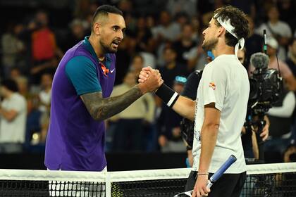 Austrias Dominic Thiem (R) and Australias Nick Kyrgios greet each other after their mens singles match on day five of the Australian Open tennis tournament in Melbourne
