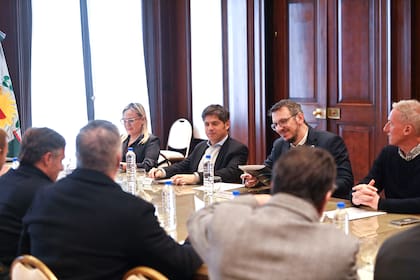 Axel Kicillof y Juan Cuattromo, presidente del Banco Provincia