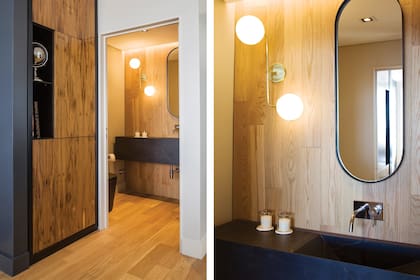 Bacha en Dekton (LOB Arquitectura). Revestimiento de pared en madera (Cortes). Aplique ‘Tokio curvo’ (Flo’s Market), en sintonía con la lámpara del comedor. Espejo ovalado (Cortes). Grifería (FV).