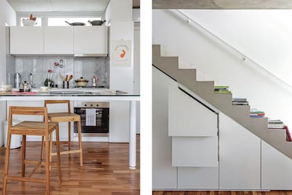Bajo mesada y alacena, todo laqueado. Cocina (Longvie). Alzada de mármol de Carrara. Extractor extensible. Taburetes (Talleres Sustentables). Repasador (Petite Margot). Poster de la bodega Pielihueso, emprendimiento de la familia de una amiga. Sobre la alacena, ollas de hierro y enlozados heredados.