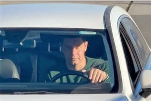 Battaglia en su auto, el día de su despedida como DT de Boca