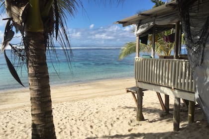 Beach fales en Samoa, preparado para los turistas.