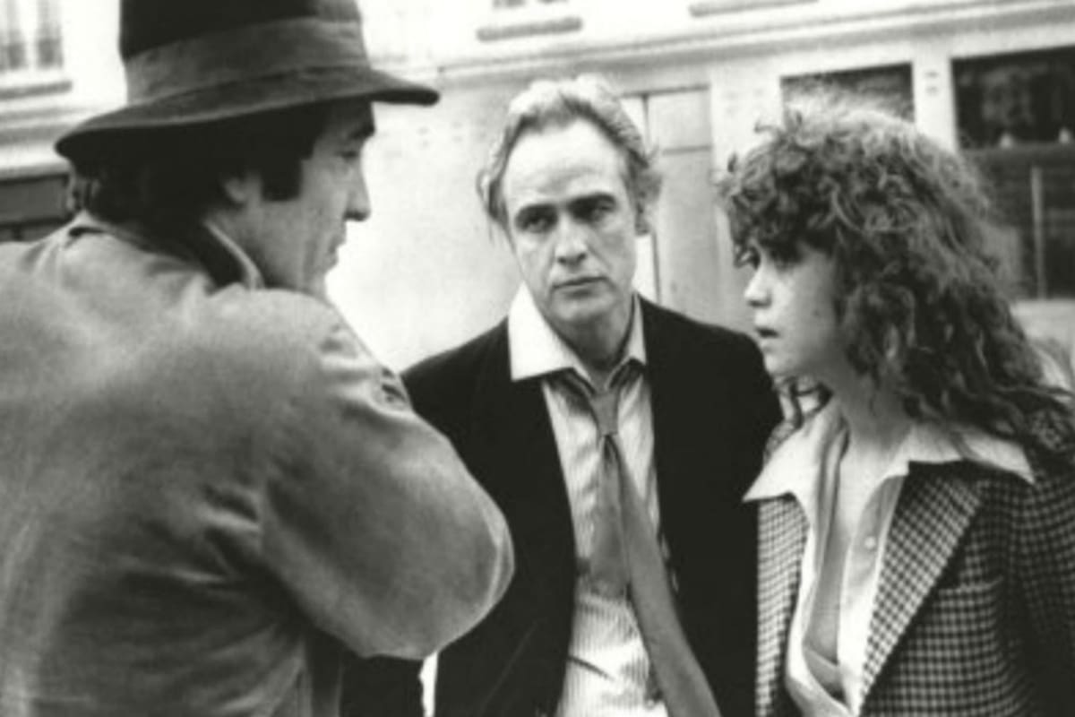 Bernardo Bertolucci en la filmación de El último tango en París, junto a Marlon Brando y Maria Schneider.