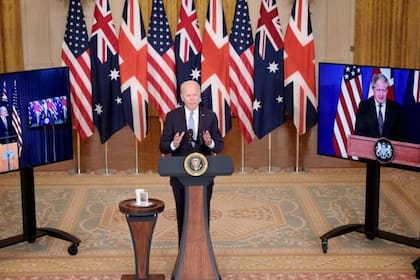 Biden presentó la nueva alianza con los líderes británico y australiano conectados por videoconferencia.