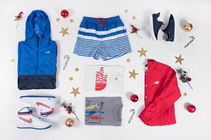 Campera rompevientos (The North Face, $5190), zapatillas sportwear (Nike, $4199), traje de baño rayado (Perramus, $1390), remera con estampa (The North Face, $1690), remera cuello redondo (Giesso, $1296), zapatillas de lona (Aldo, $3200) y maxicampera (New Balance, $2099)
