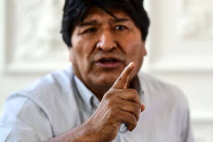 Bolivias ex-President Evo Morales speaks during an interview with AFP in Buenos Aires, on December 24, 2019. (Photo by RONALDO SCHEMIDT / AFP)