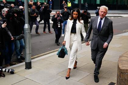 Boris Becker llega con su novia Lilian de Carvalho Monteiro al tribunal de Londres para escuchar el veredicto de su sentencia Photo: Victoria Jones/PA Wire/dpa