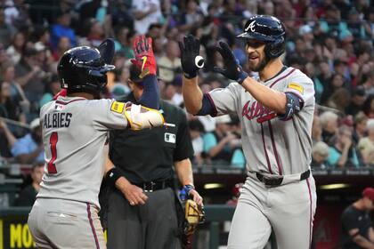 Bravos superan 4 HR's de Suárez y remontan para ganar 8-7 en 10 entradas ante D-backs