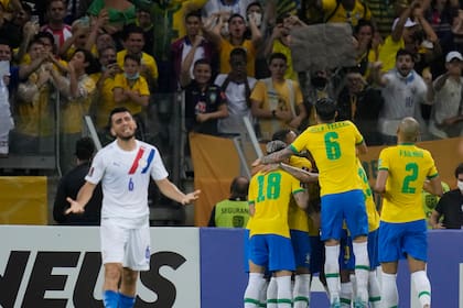 Brazil players celebrated after their teammate Brazil's Rodrygo scoring his side's 4th goal against Paraguay during a qualifying soccer match for the FIFA World Cup Qatar 2022 at Mineirao stadium in Belo Horizonte, Brazil, Tuesday, Feb. 1, 2022. (AP Photo/Andre Penner)