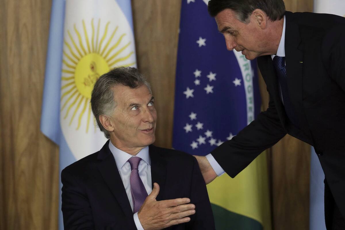 Brazils President Jair Bolsonaro, right, talks with Argentinas President Mauricio Macri during a meeting at Planalto presidential palace in Brasilia, Brazil, Wednesday, Jan. 16, 2019. Macri is a one-day visit to Brazil.