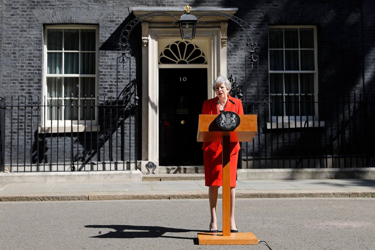 Britains Prime Minister Theresa May announces her resignation outside 10 Downing street in central London on May 24, 2019. - Beleaguered British Prime Minister Theresa May announced on Friday that she will resign on June 7, 2019 following a Conservative Party mutiny over her remaining in power. (Pho