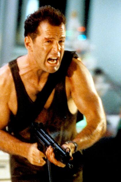 Bruce Willis como John McClane en Duro de Matar, quizá su personaje más icónico