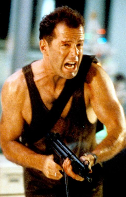 Bruce Willis como John McClane en Duro de Matar, quizá su personaje más icónico