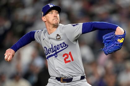 Buehler firma con Padres tras larga carrera con Dodgers, su rival del Oeste de la Nacional