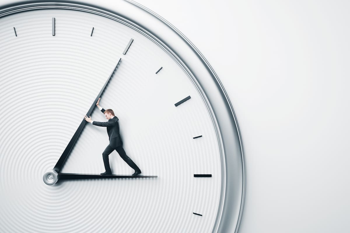 Businessman trying to stop time