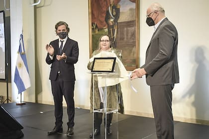 Cafiero, Peñafort y Javier Timerman, en el homenaje al excanciller