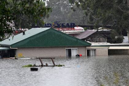CAMBIO CLIMÁTICO: una vista de una zona residencial inundada cerca de Windsor. Lluvias torrenciales azotaron el este de Australia y obligaron a miles de personas a huir de las peores inundaciones en décadas