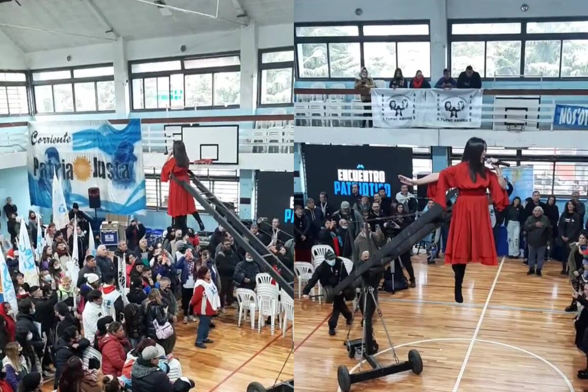 Cantó el himno colgada de una grúa