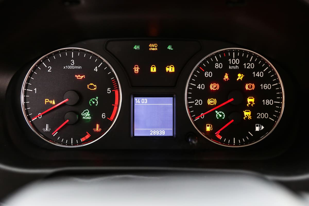 car dashboard with lights symbols close up