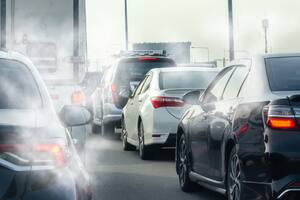 Car smog and air pollution from the exhaust pipe.