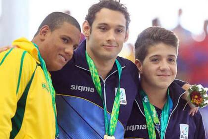 Carlomagno y Arregui sumaron oro desde la natación