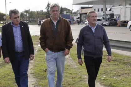 Carlos Achetoni (FAA), Nicolás Pino (SRA) y Elbio Laucirica (Coninagro)