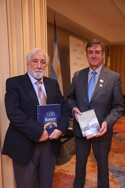 Carlos Danilo Molinero y Federico Eijo, presidente del Rotary Club