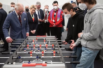 Carlos jugó al metegol en un centro de refugiados ucranianos.