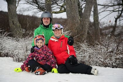 Carlos y Flavia junto a su hija Helena