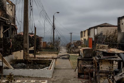 Casas quemadas en El Olivar, Viña del Mar. (Cristóbal Olivares/The New York Times)