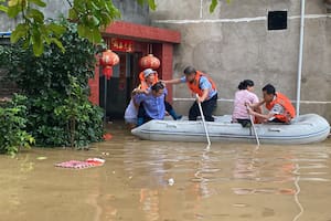 China; tormentas; evacuados; MUndo