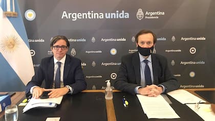 Christian Asinelli y Gustavo Beliz, quien desistió de ser candidato a la CAF