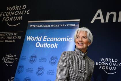 Christine Lagarde. directora gerente del FMI, al presentar ayer las nuevas proyecciones del organismo en el Foro de Davos