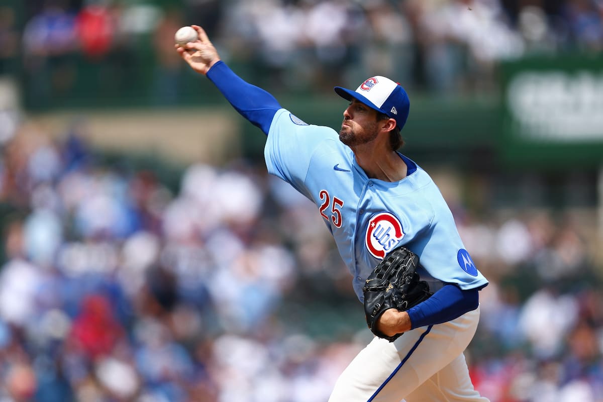 Clary Holmes, lanzador de los Cachorros de Chicago, labora en el duelo del viernes 14 de agosto de 2