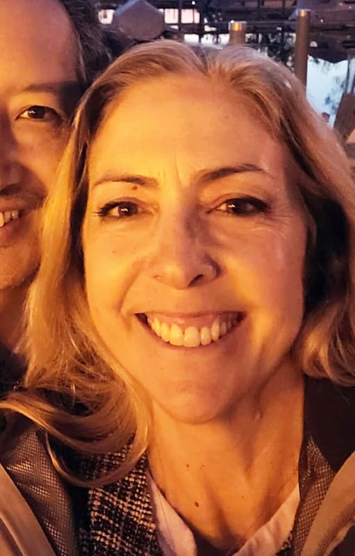 Claudia, junto a su marido