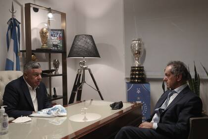 Claudio Tapia y Daniel Scioli
