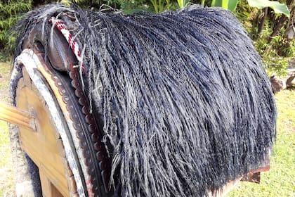 Cojinillo de hilo, catrielero, sobre un recado de lomillo